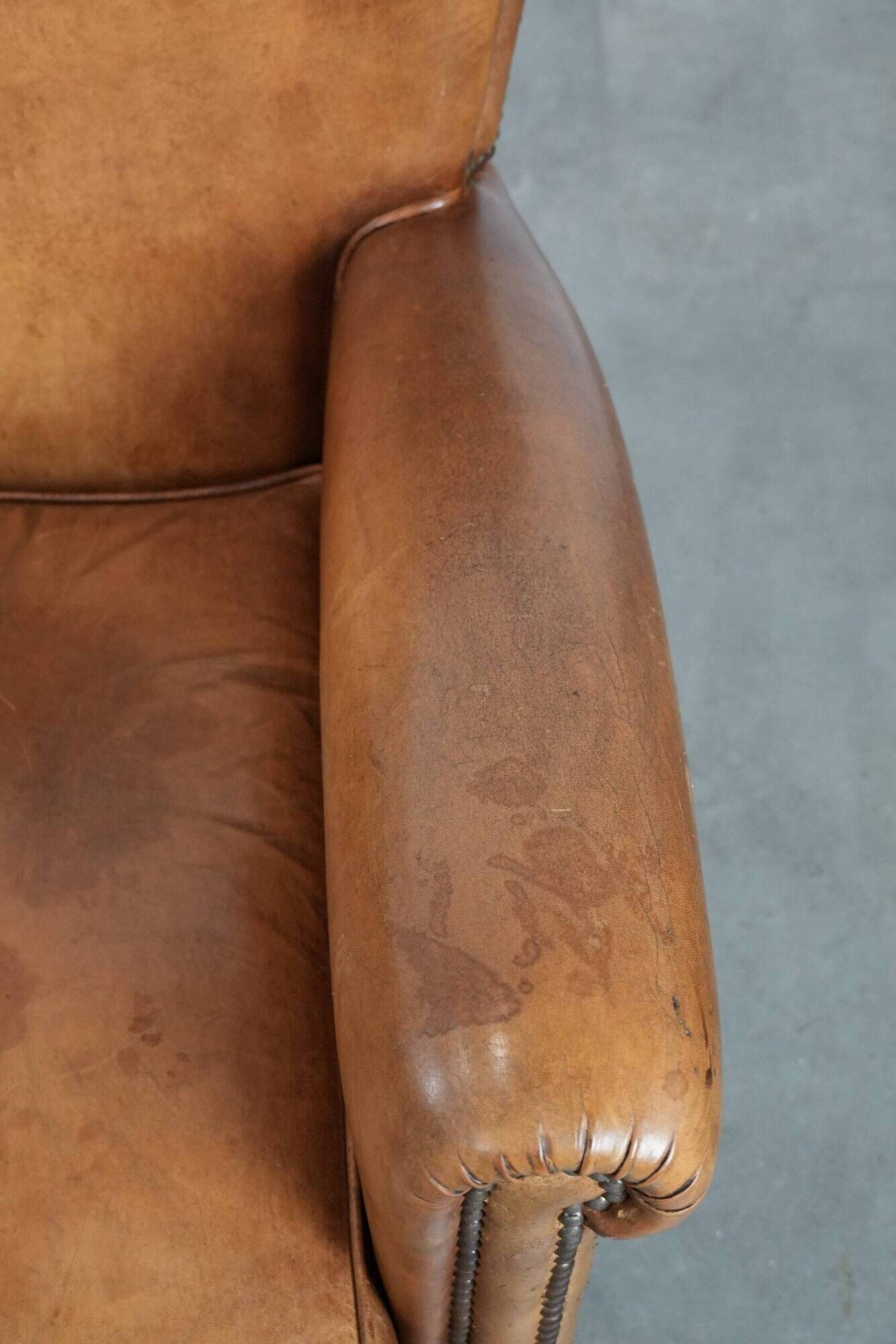 Set of two vintage sheepskin armchairs with beautiful and warm colours