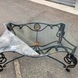 Wrought iron coffee table with glass top