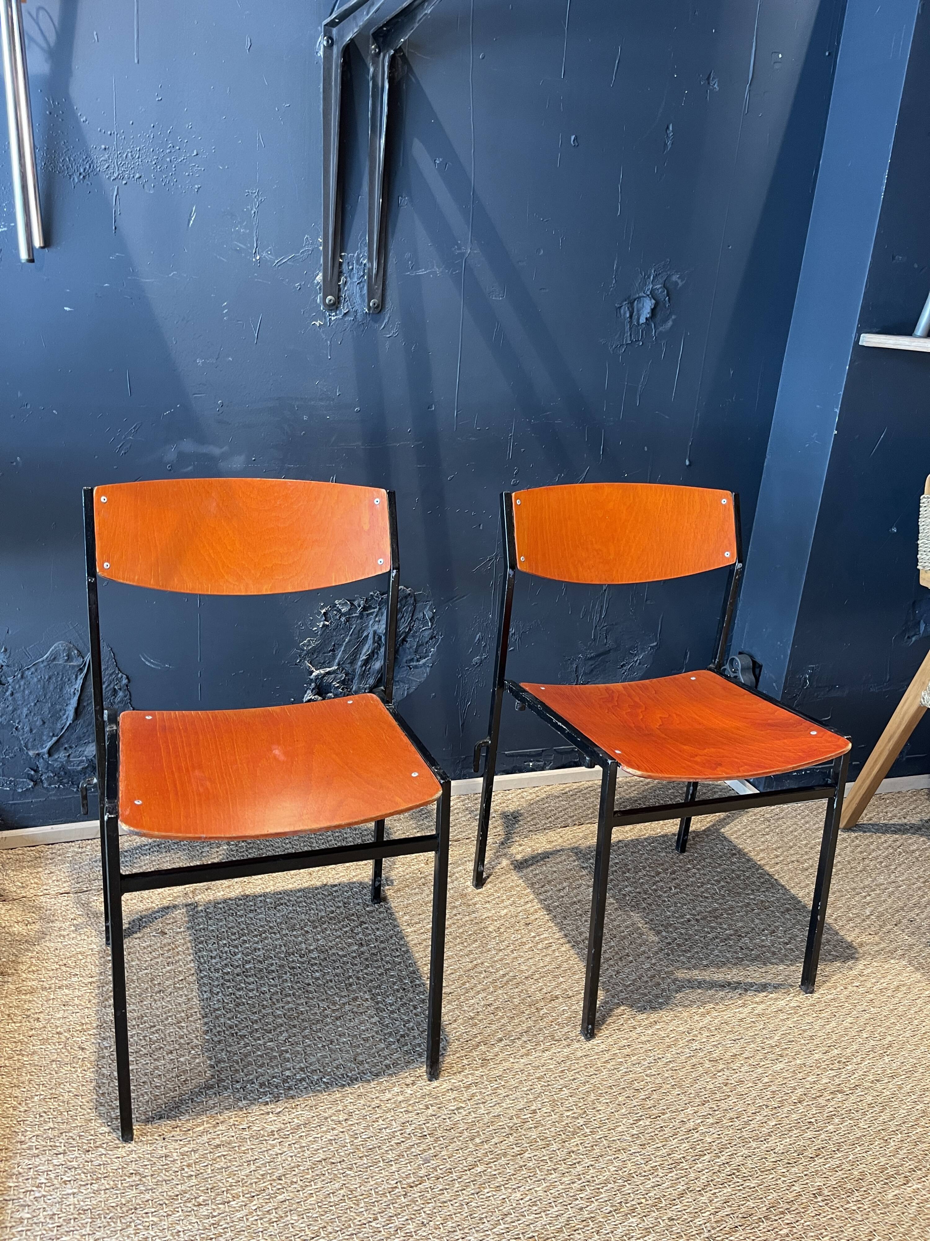 Pair of Gijs Van Der Sluis chairs in orange wood with black legs, Netherlands