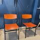 Pair of Gijs Van Der Sluis chairs in orange wood with black legs, Netherlands