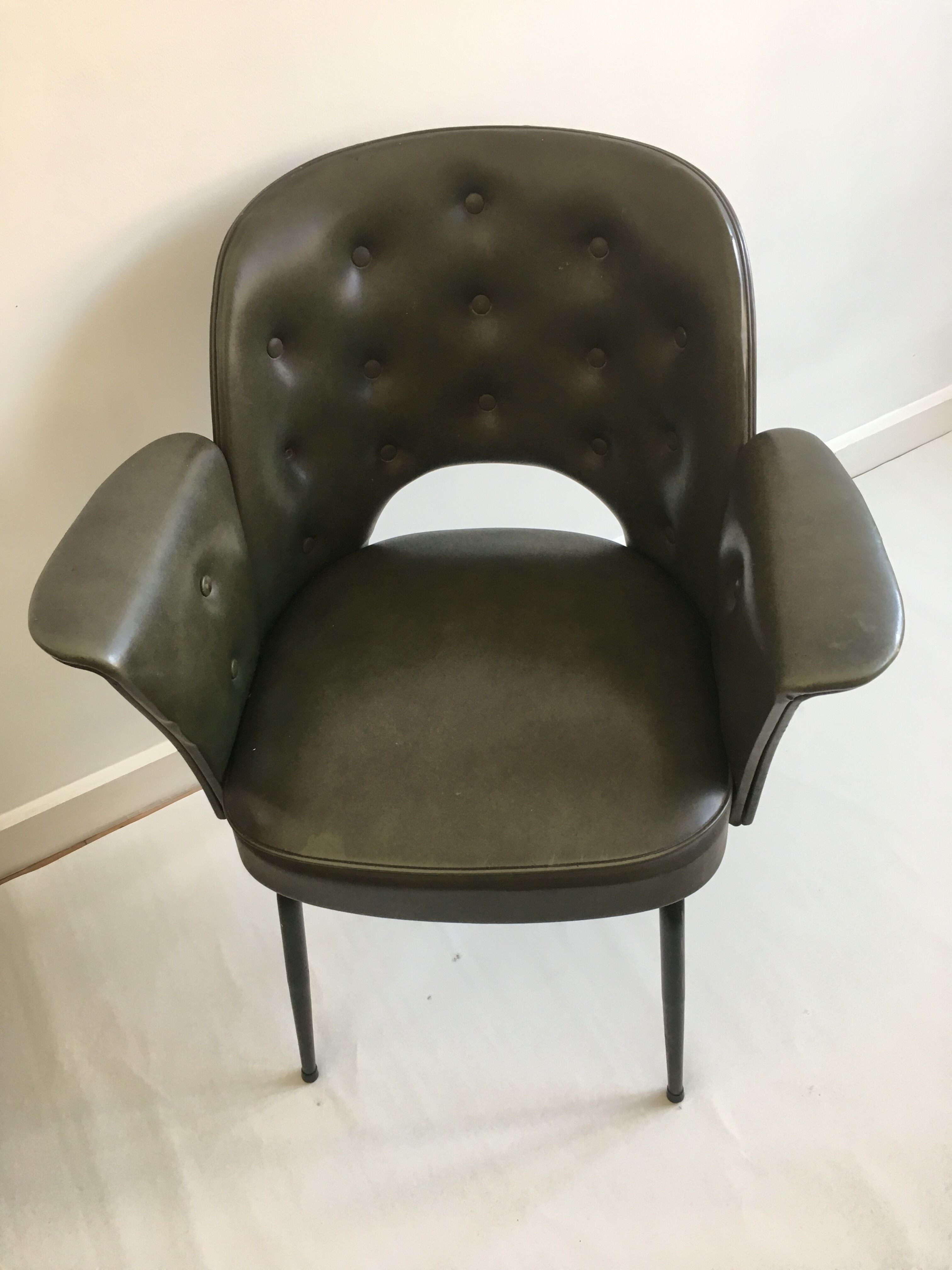 Chair in bottle green leatherette