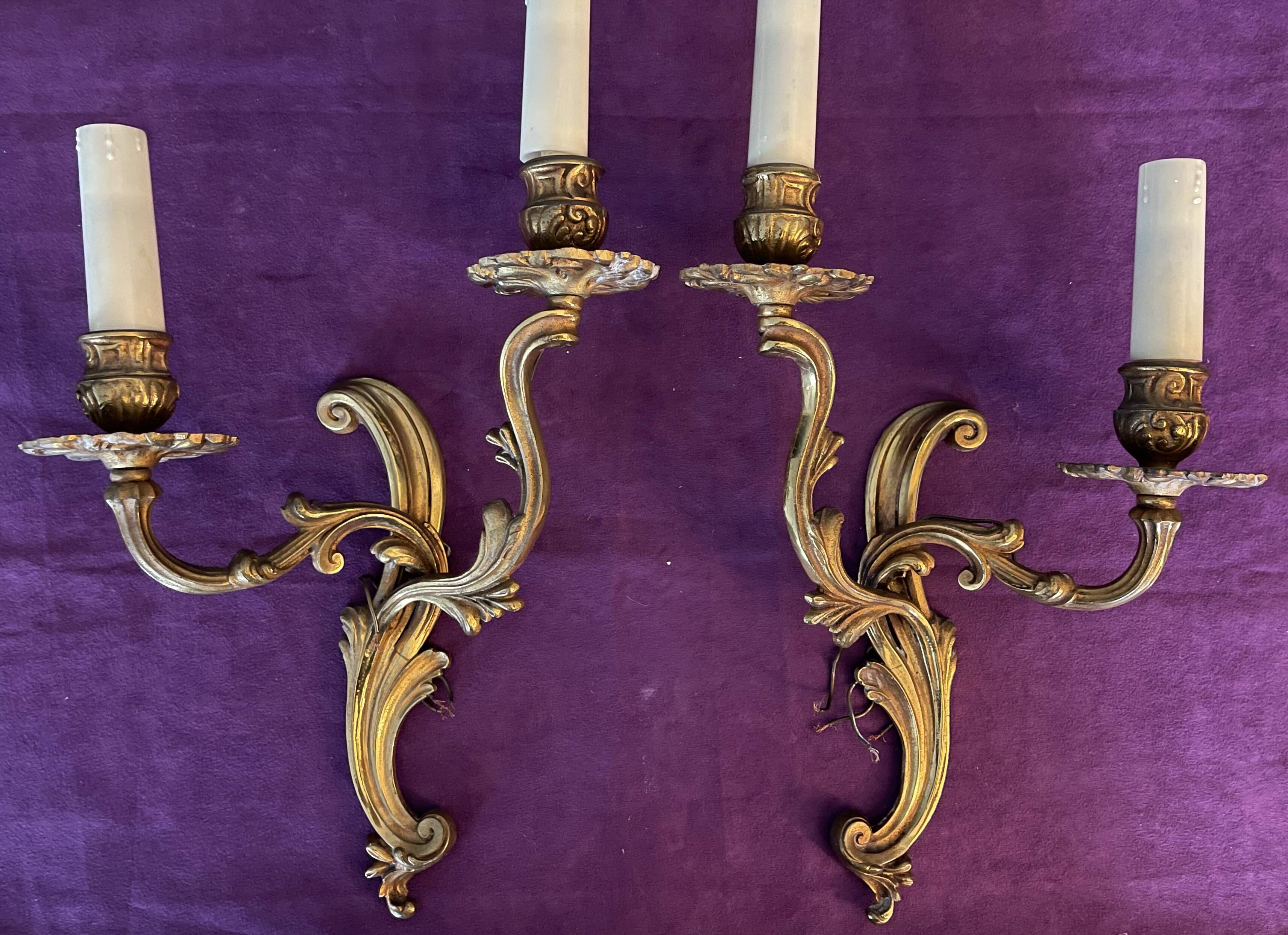 Pair of gilded bronze wall lights, 1950