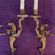 Pair of gilded bronze wall lights, 1950