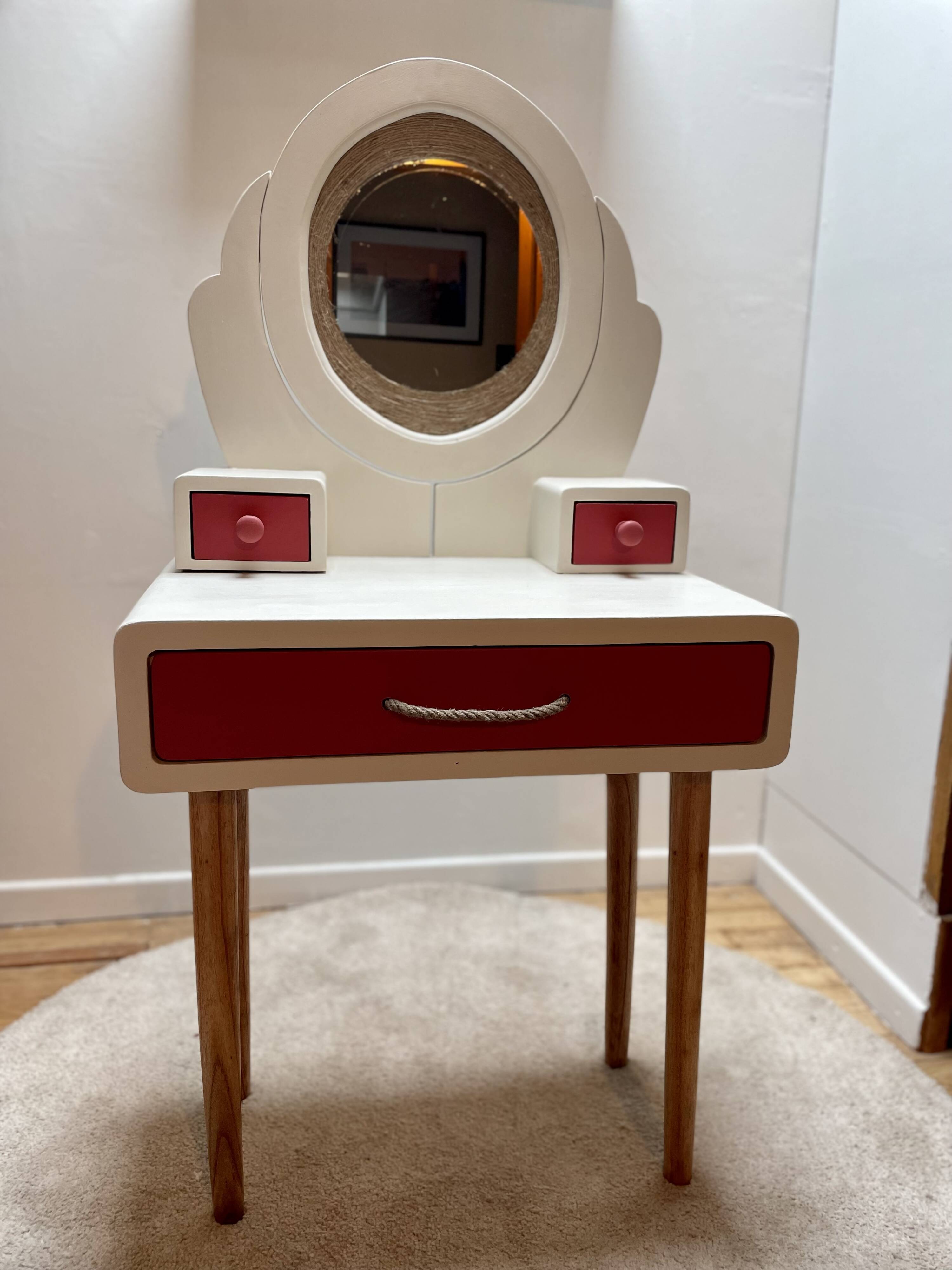Wooden dressing table with beige and red baroque style mirror