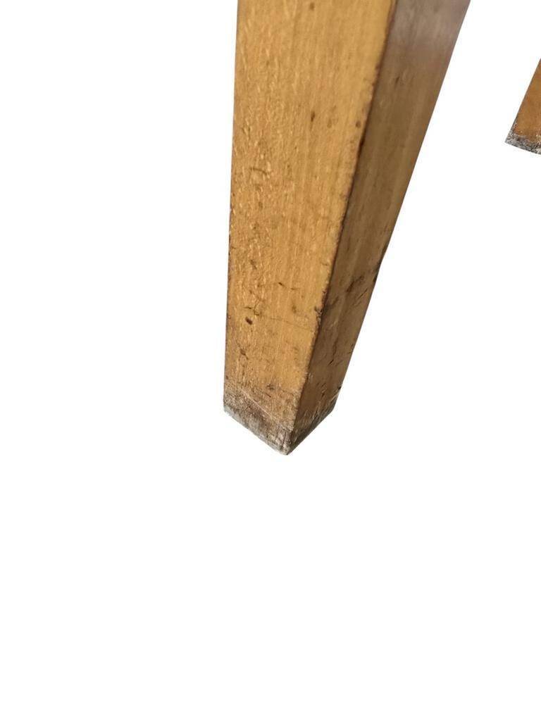 Vintage wooden table with a mint green top.