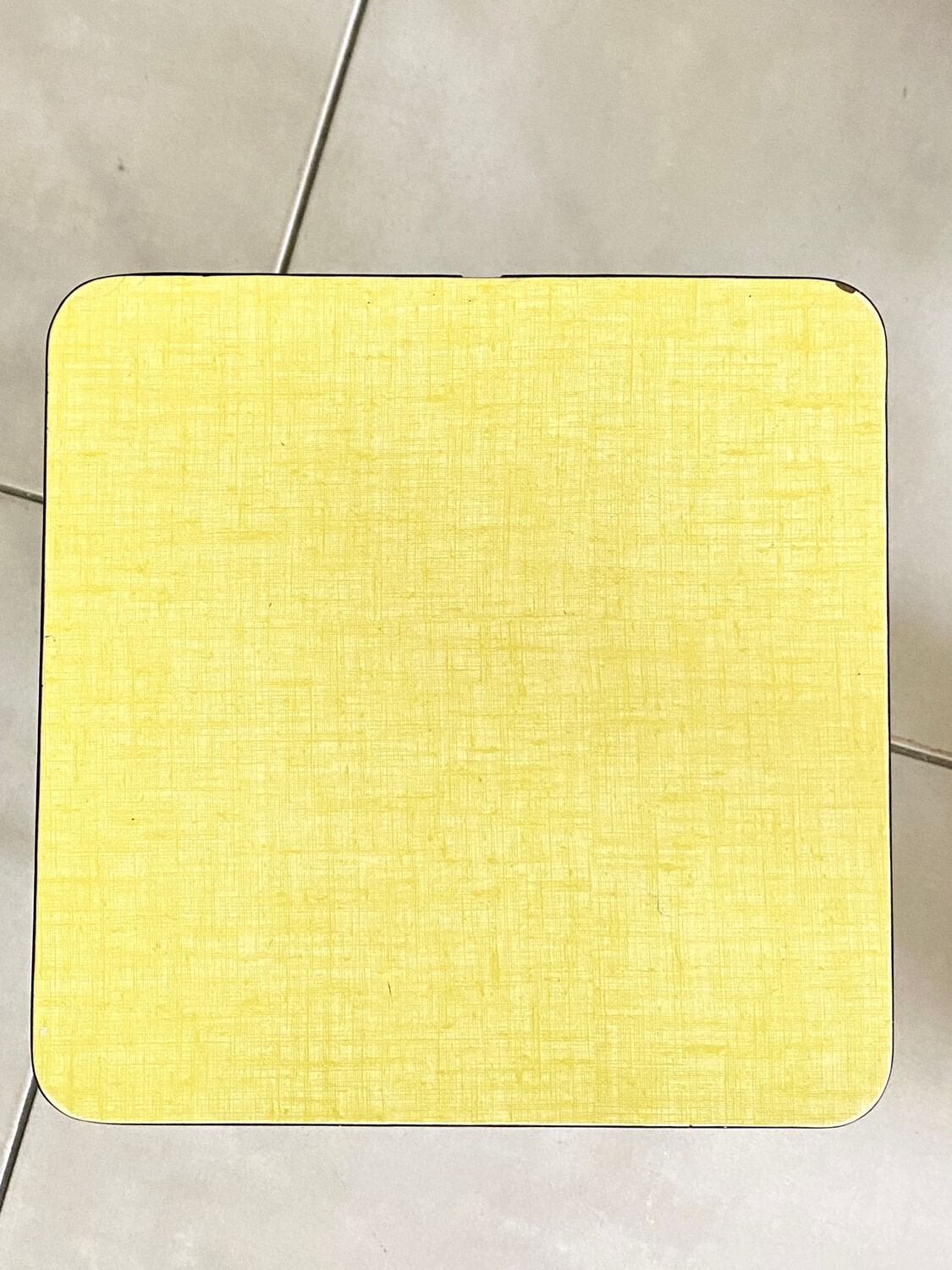 Yellow Formica stool