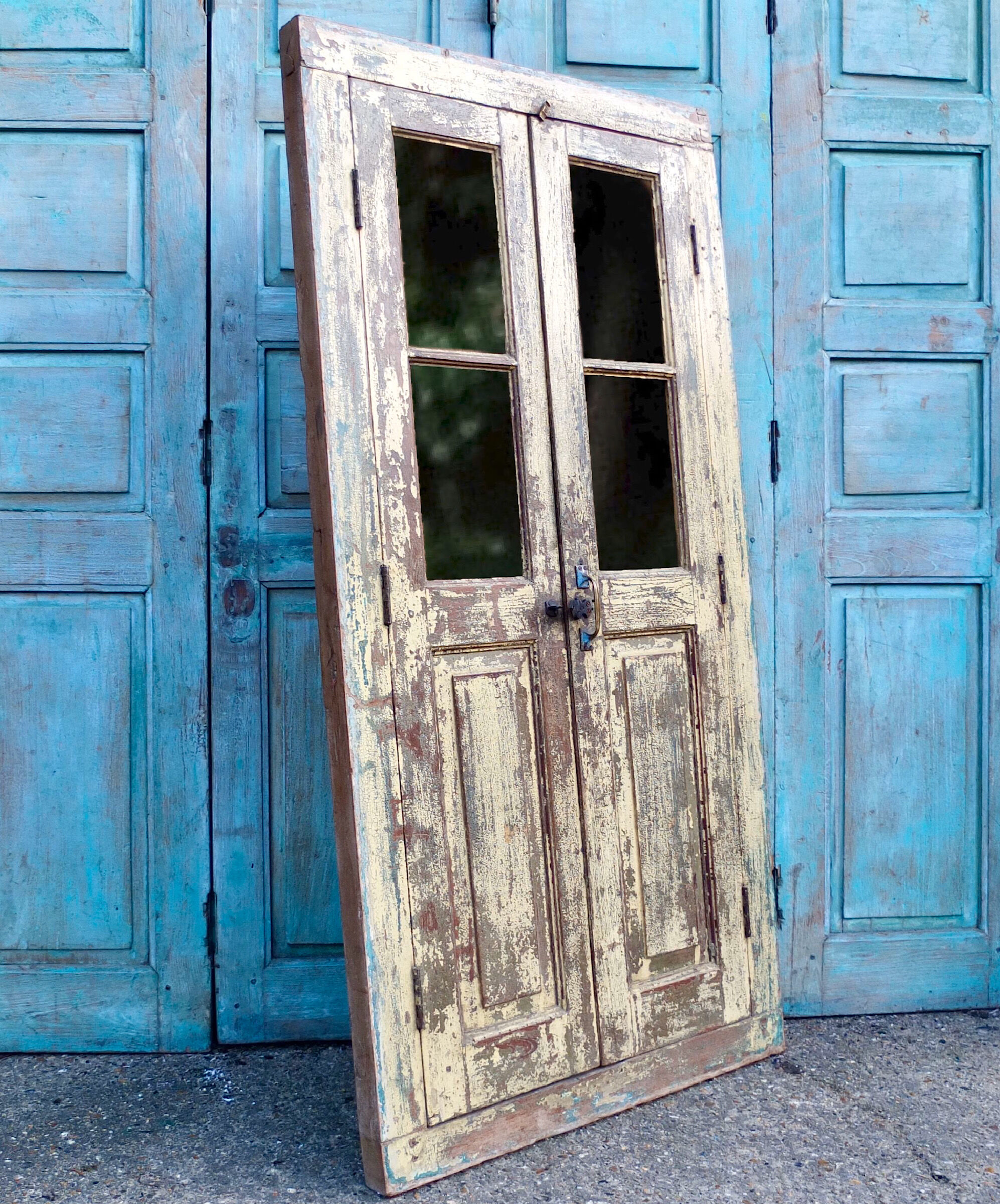 A Gorgeous Pair of Large Yellow Antique Shutter Doors