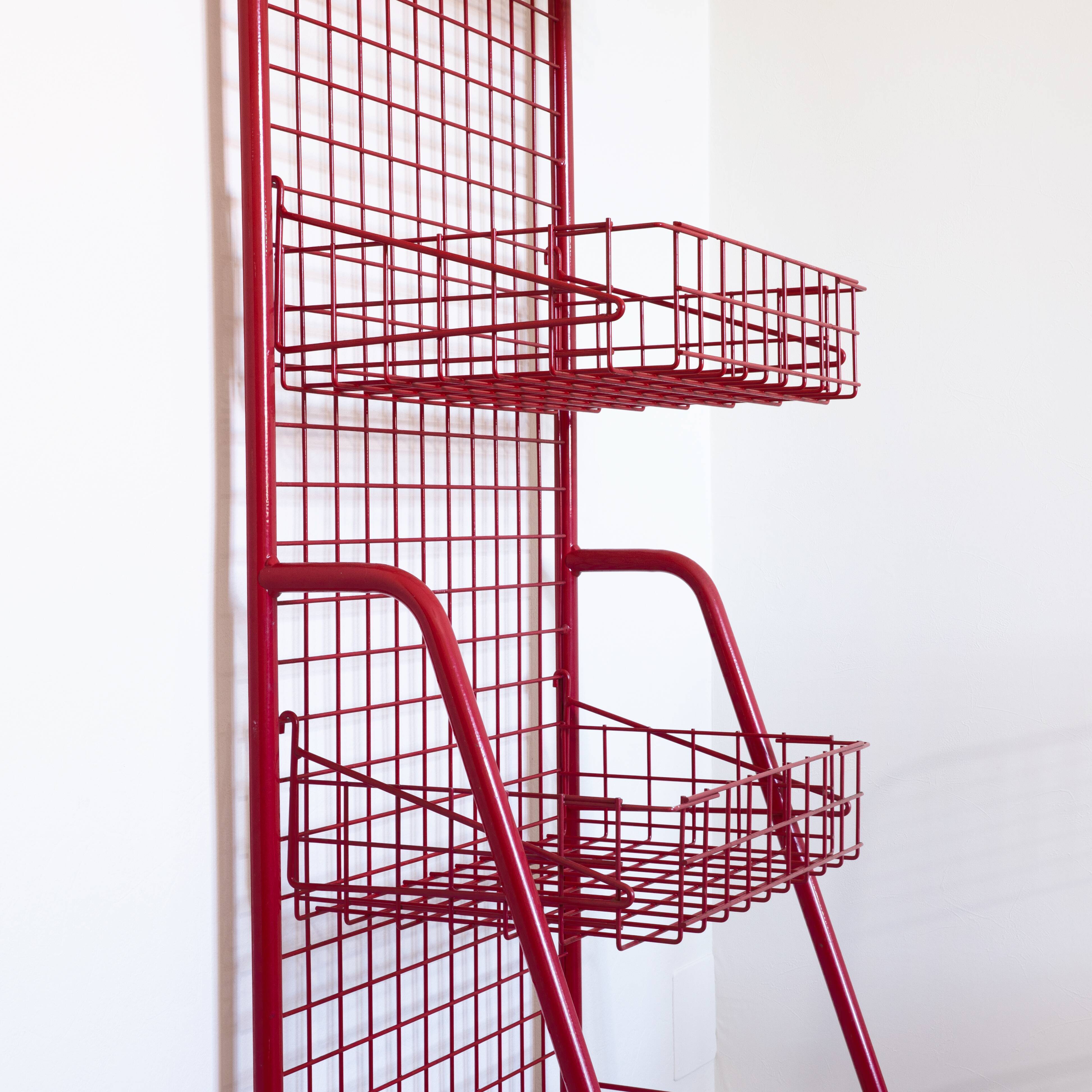 Red mesh metal grocery shelf