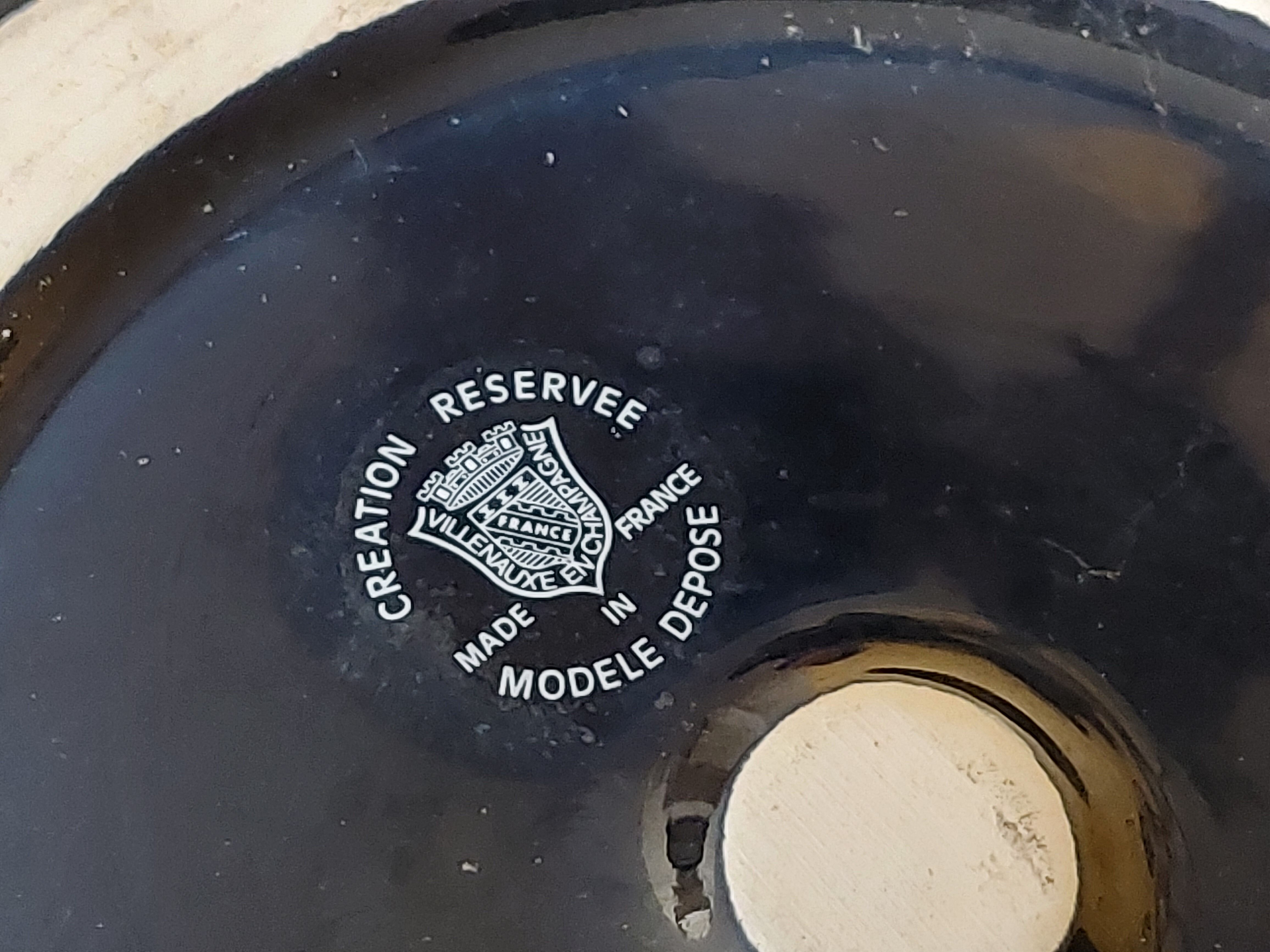Navy blue ceramic refresher stamped