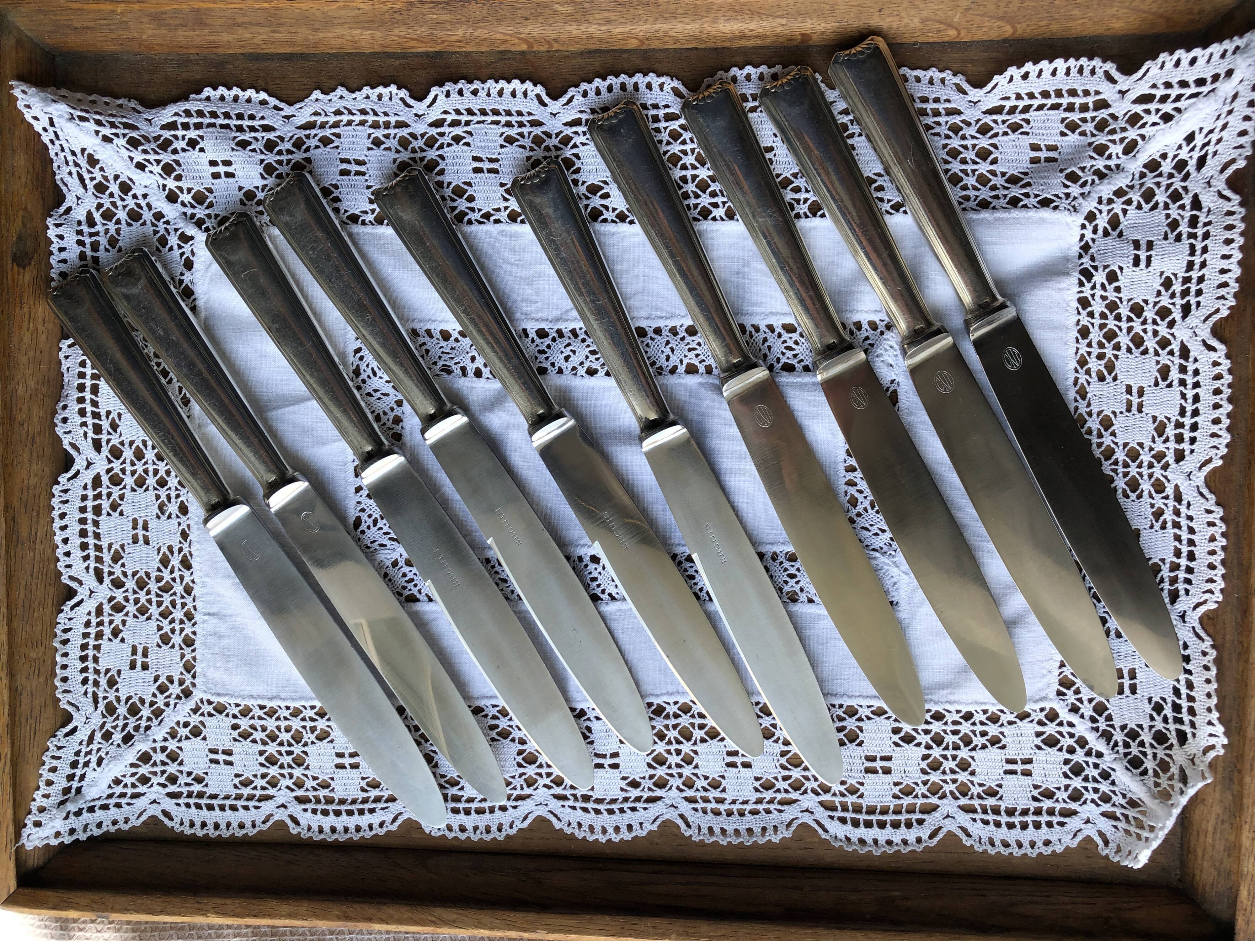 Série de 10 couteaux de table ercuis métal argenté