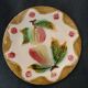 Assiette ancienne en barbotine