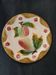 Assiette ancienne en barbotine