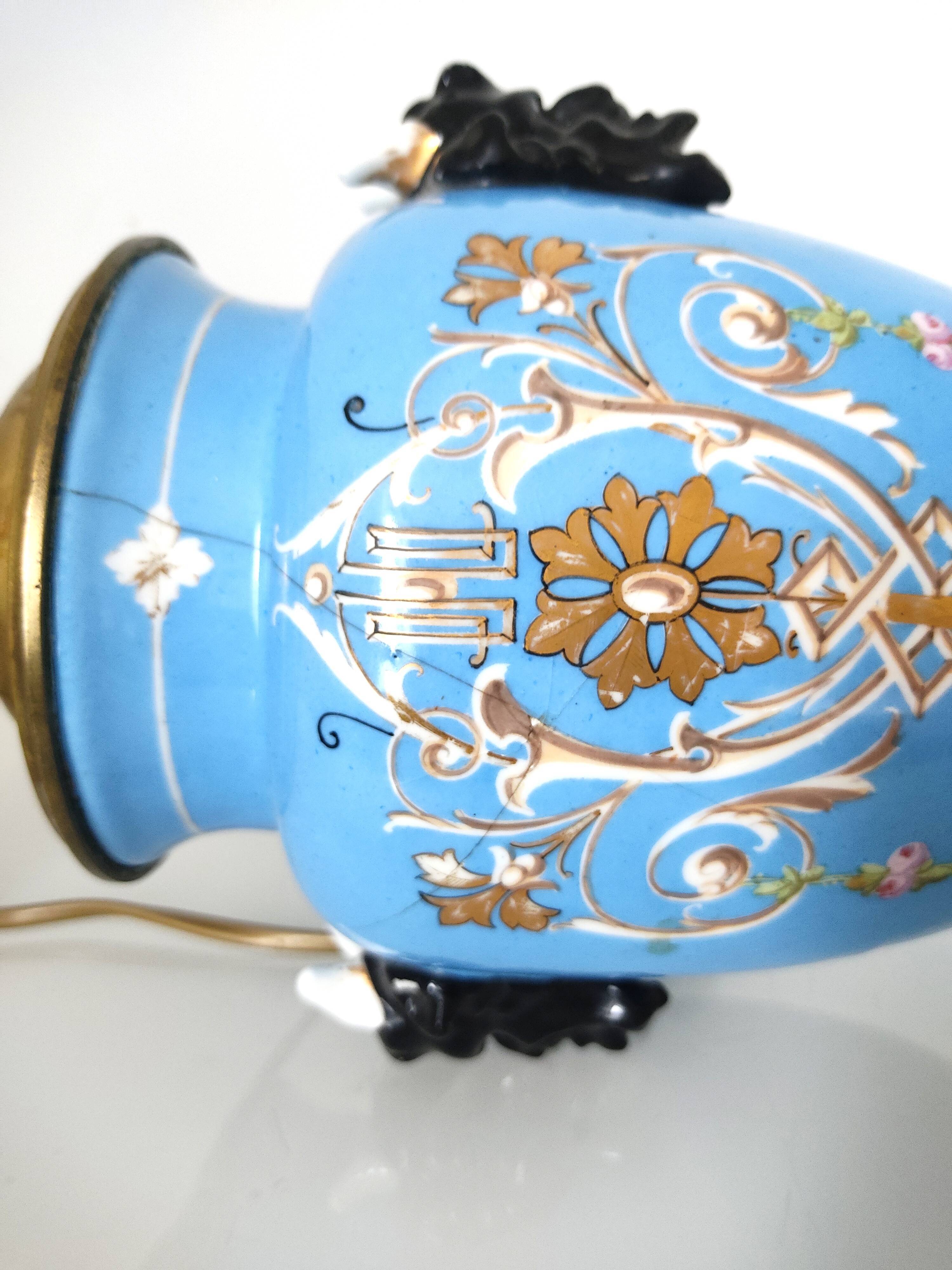 Lamp foot blue vase heads of fauna