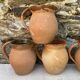 set of terracotta jugs country style