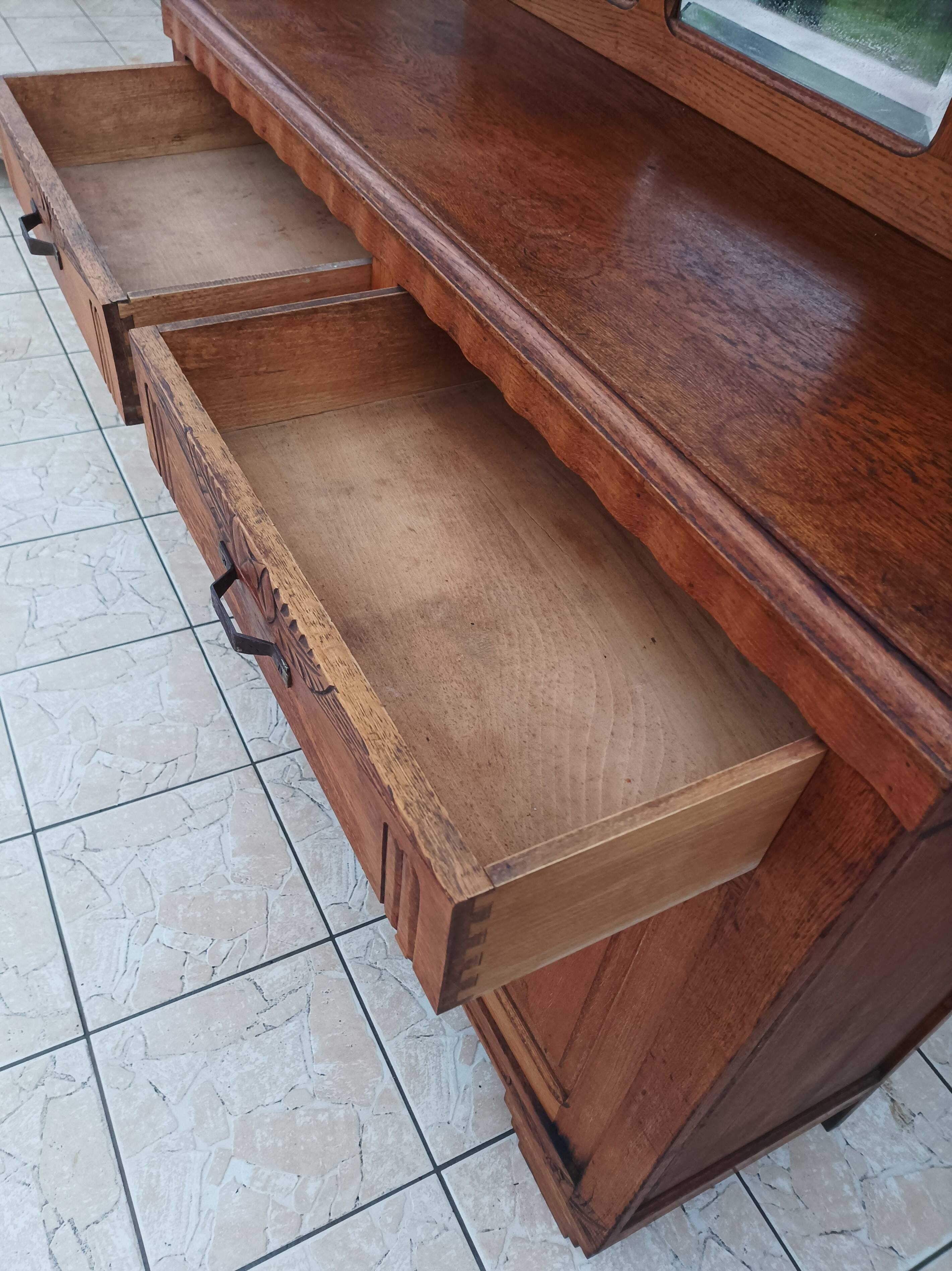 Art Deco period carved oak sideboard