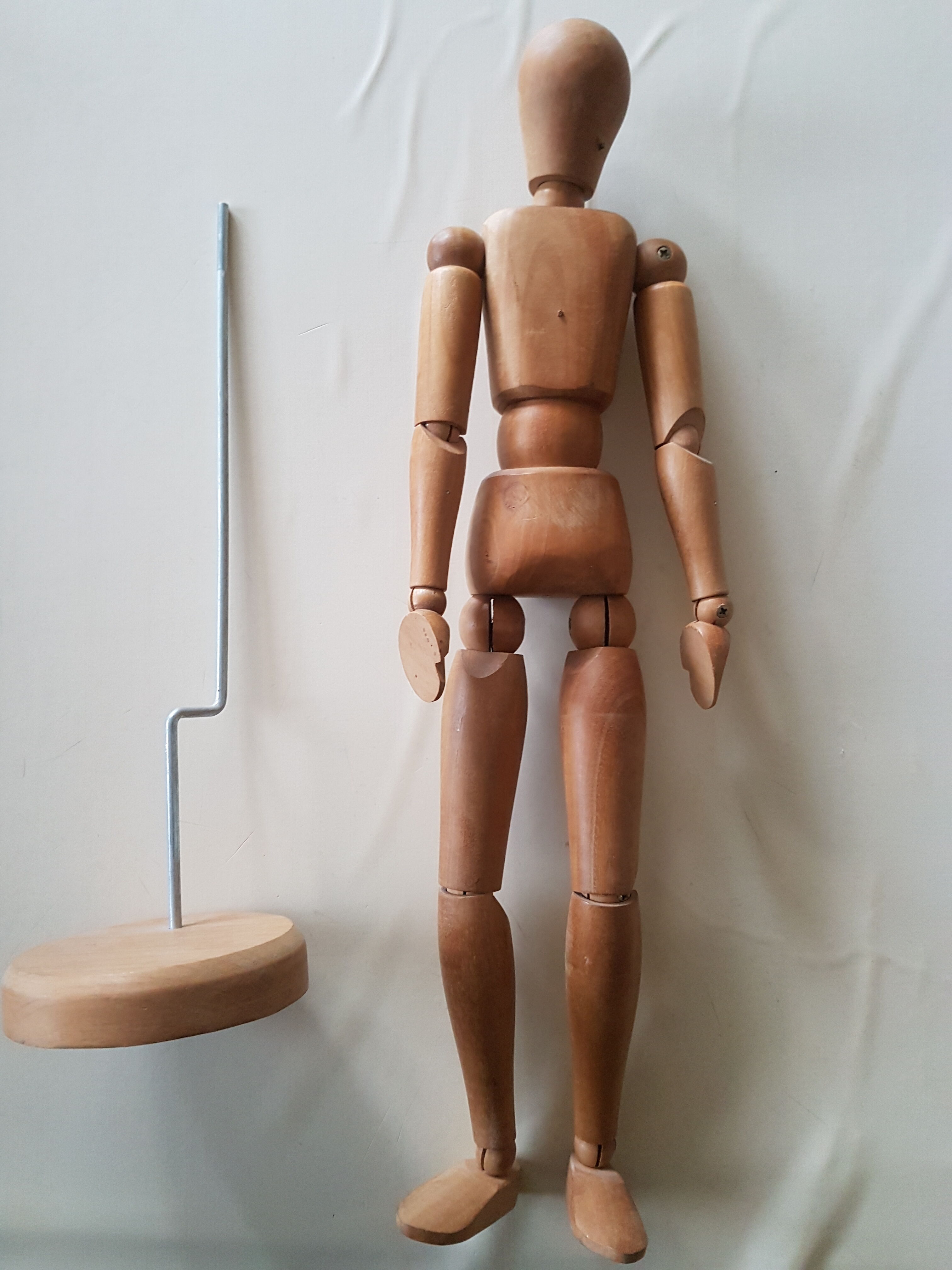 Articulated waxed wood puppet and 80's support