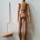 Articulated waxed wood puppet and 80's support