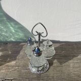 Silver-plated metal and glass salt and pepper shakers