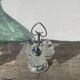 Silver-plated metal and glass salt and pepper shakers