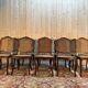 Suite de 10 chaises de style Louis XV en noyer et cannage