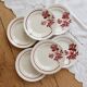 6 vintage dessert plates Moulin des Loups with burgundy floral decoration.