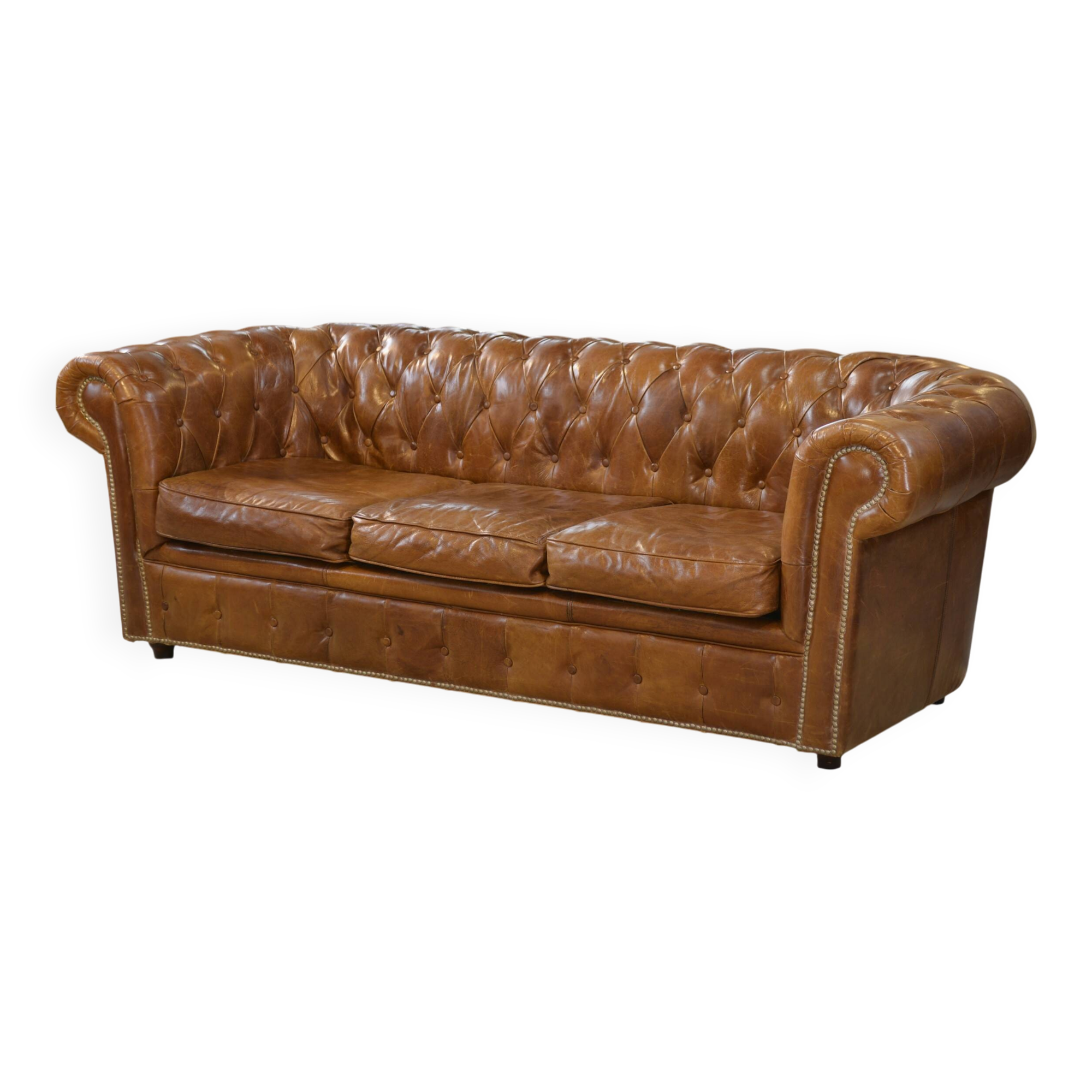 Brown leather Chesterfield sofa