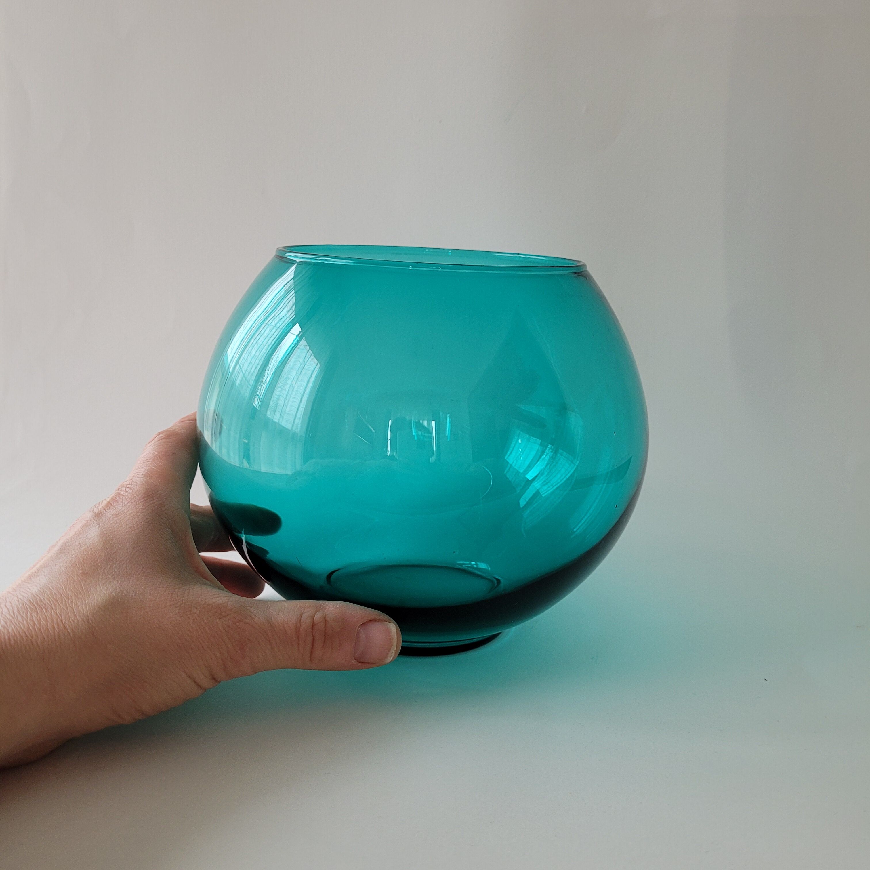 Round blue glass vase