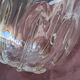 Twisted moulded glass bistro champagne bucket with a silver metal collar.