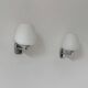Pair of vintage opaline and chrome metal wall lights, France, 1970.