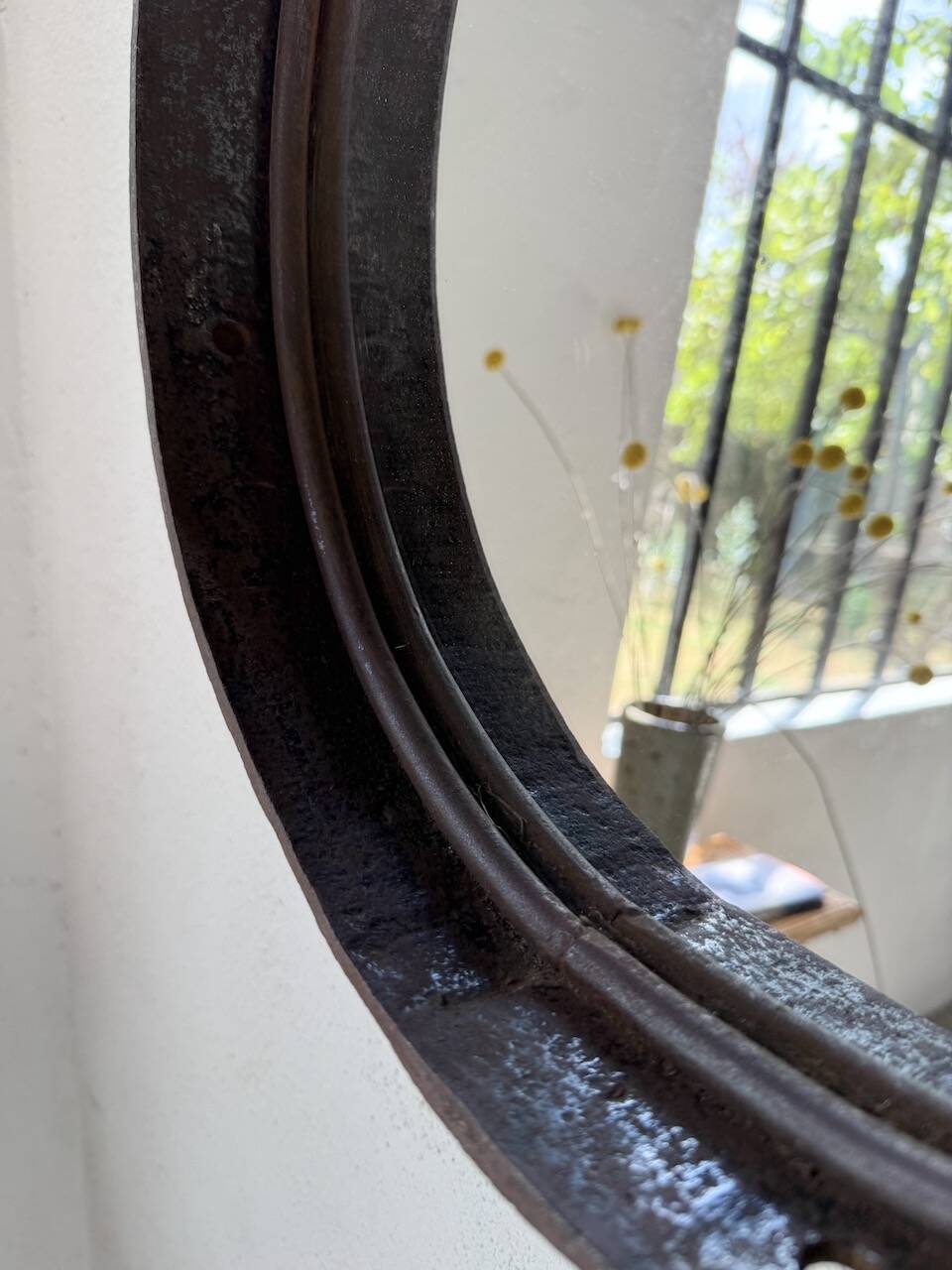 Brutalist mirror with metal chain from the 50s