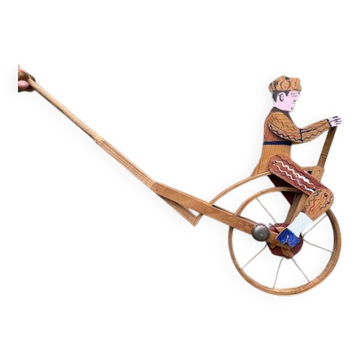 Old wooden push toy