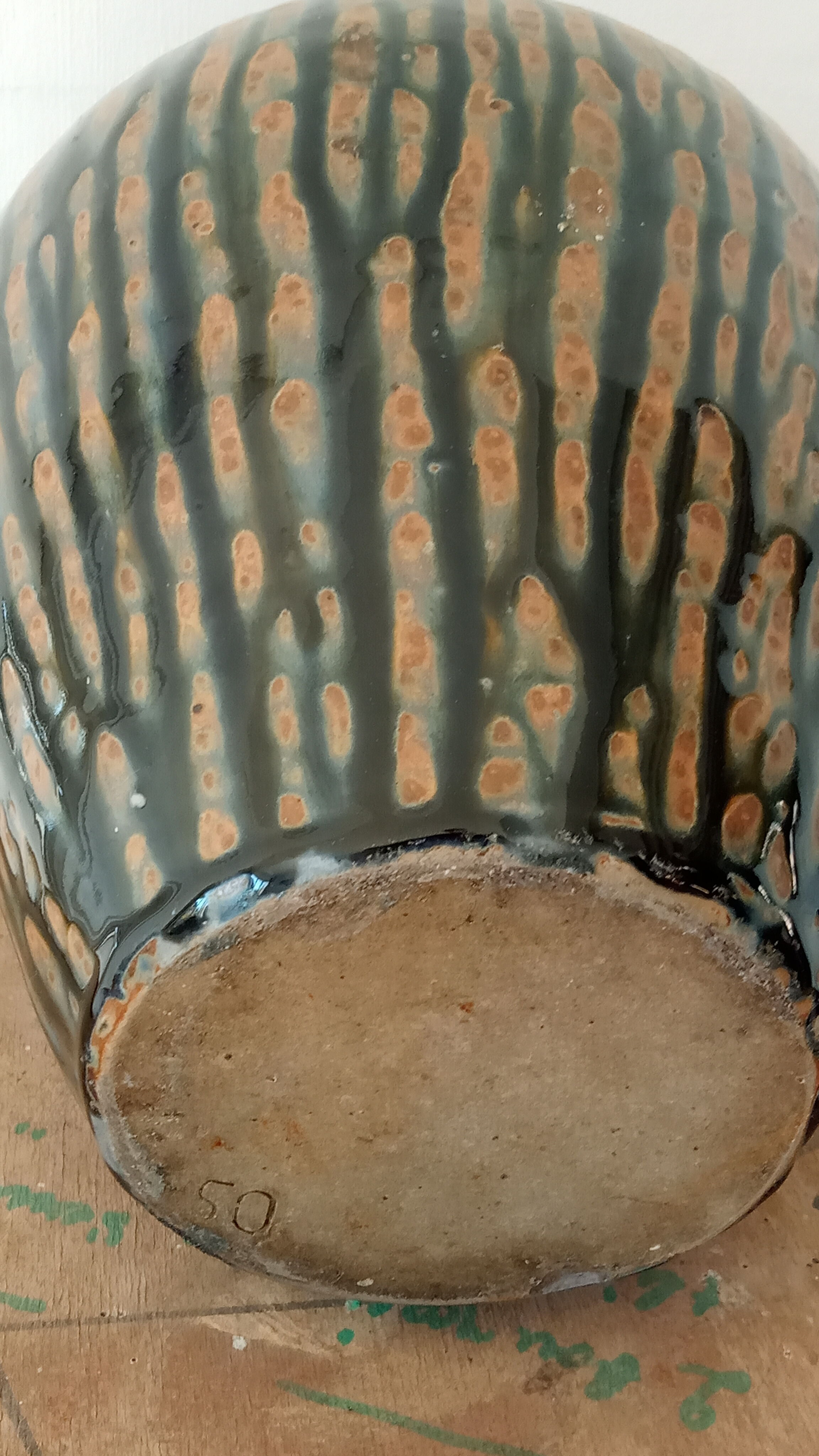 Enamelled sandstone vase