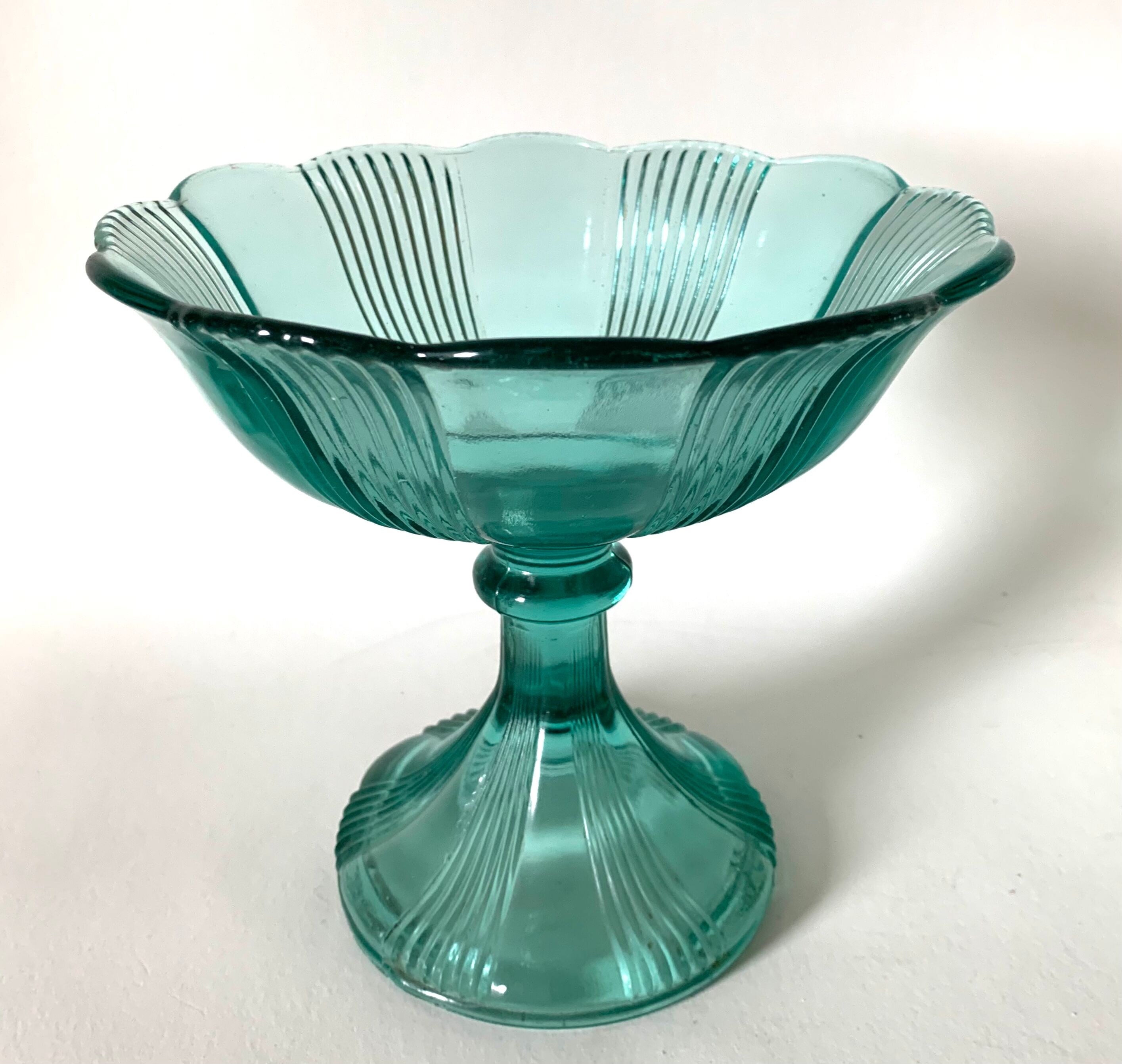 Green glass standing cup