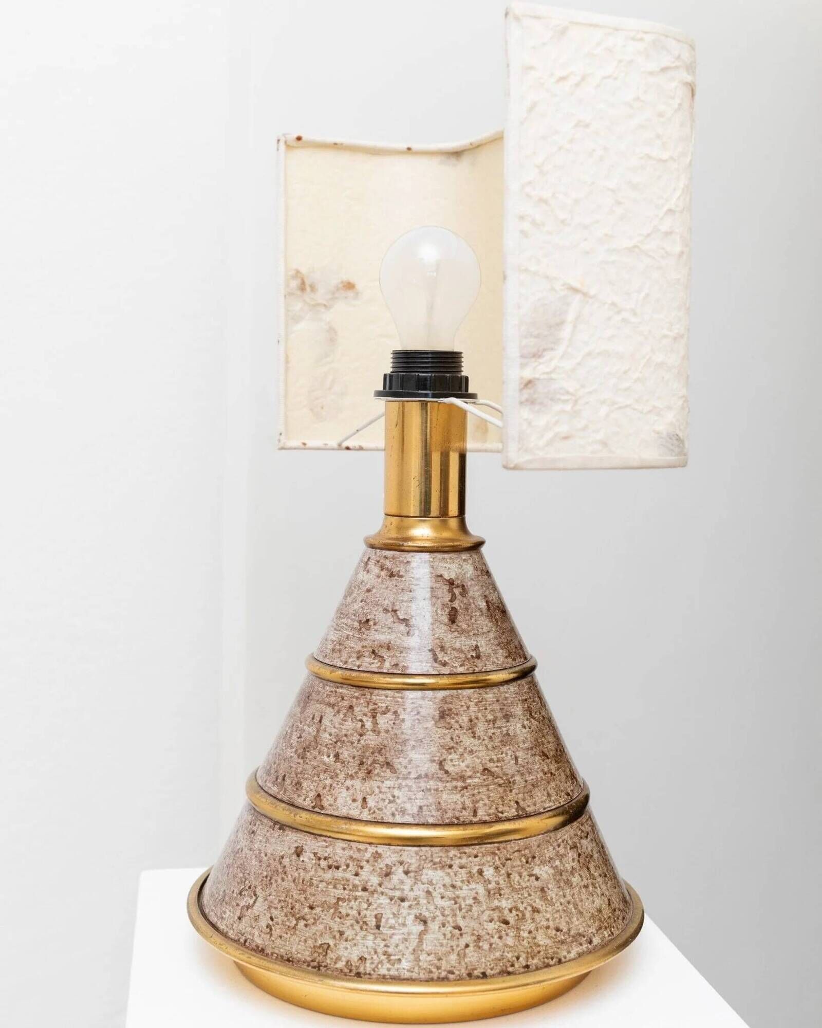 Brown ceramic mid-century table lamp with cream handmade paper floral shade and brass accents