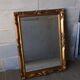Miroir en bois doré biseauté