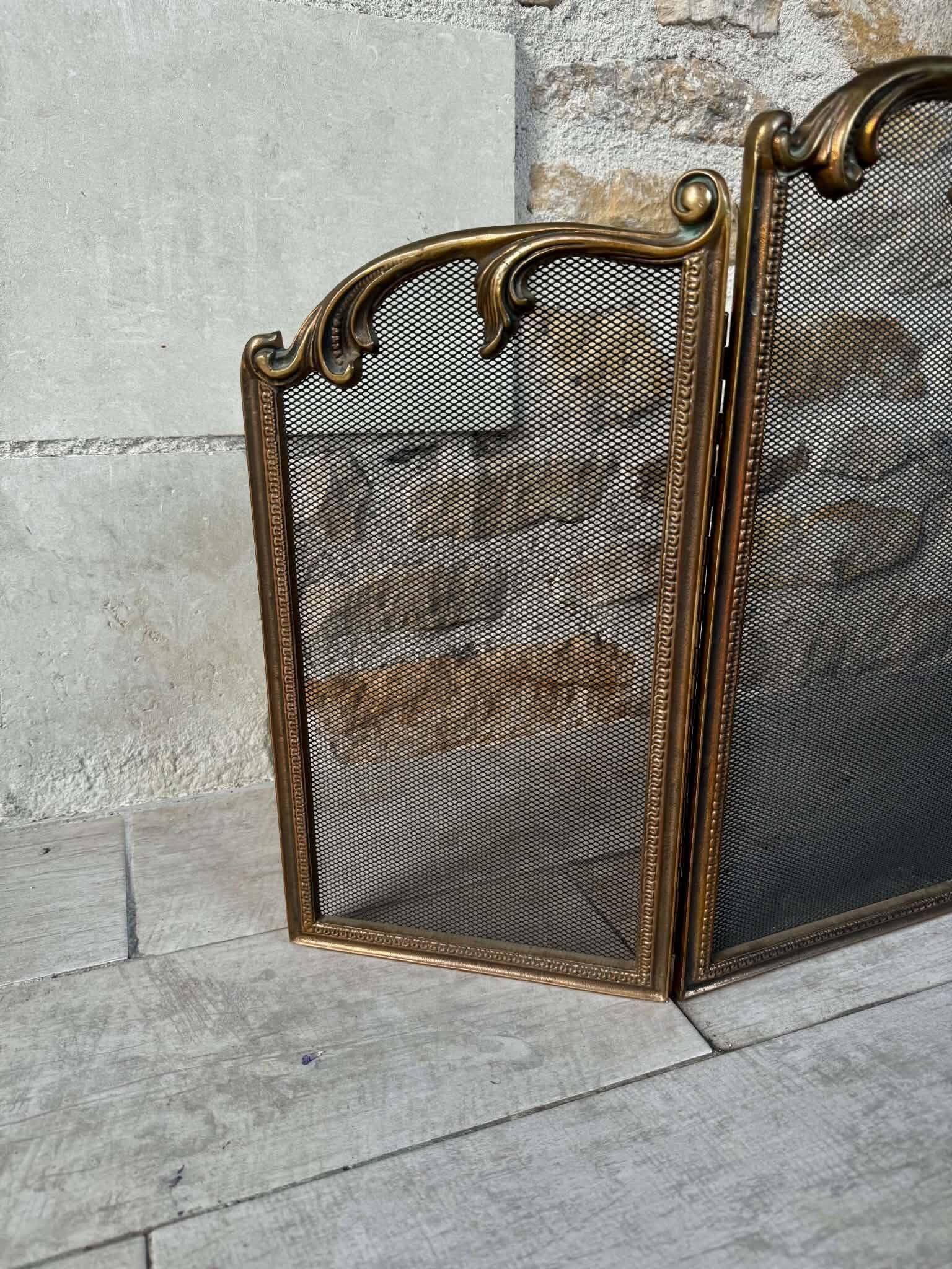 Brass fireplace screen in Louis XV style