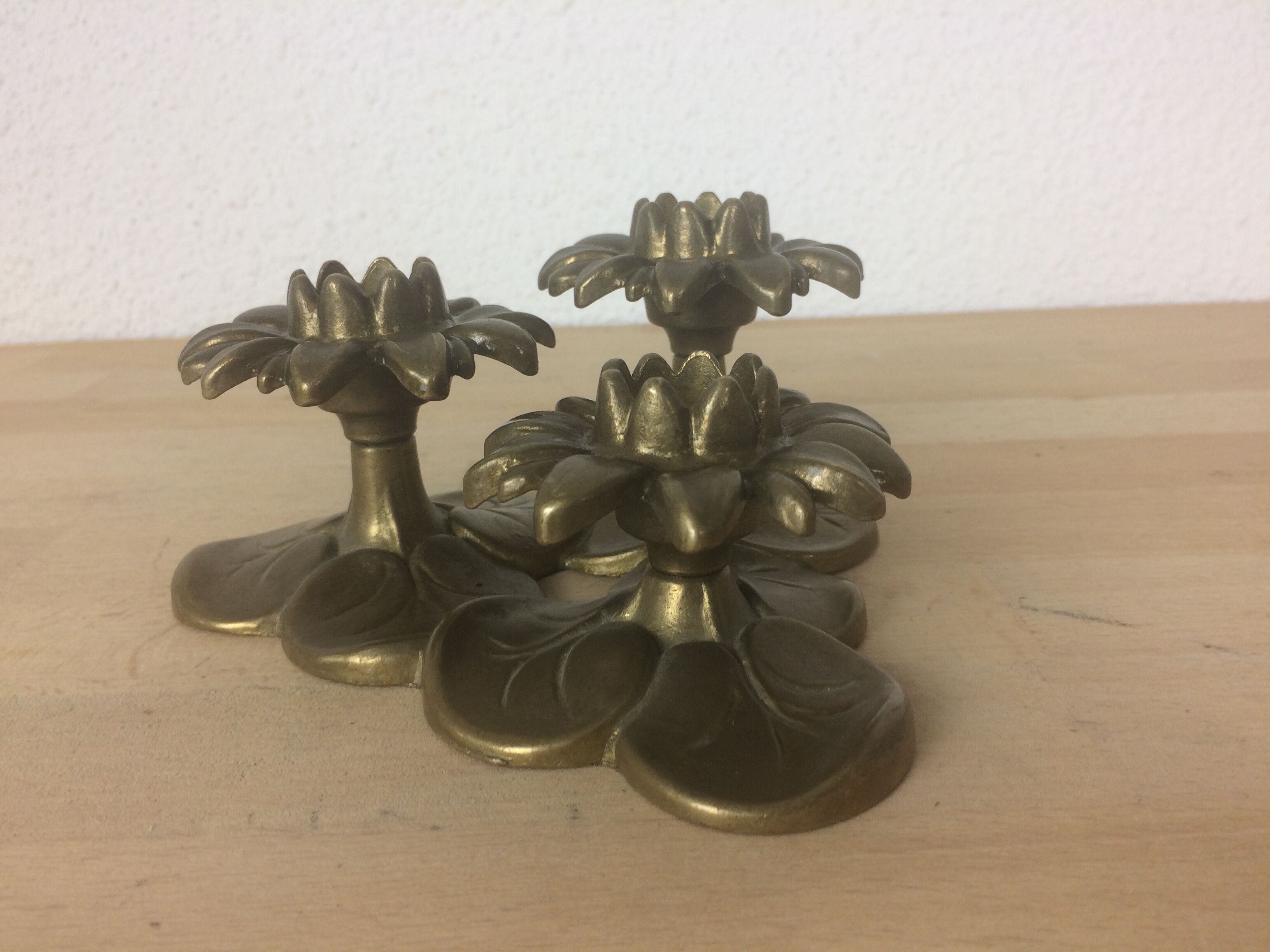 Triple brass flower candlestick