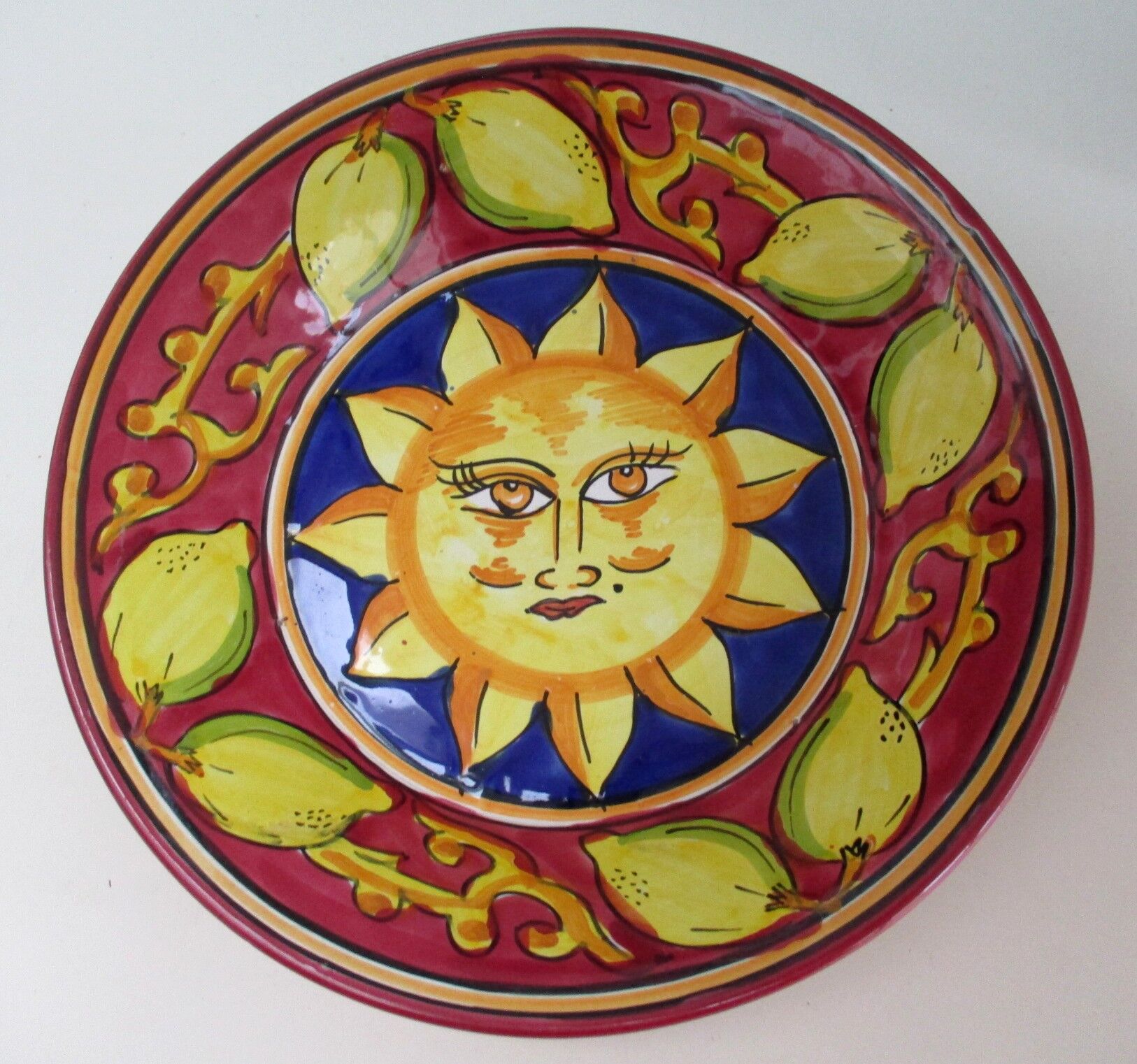 Hand-decorated ceramic plate - sun