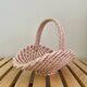 Vintage pink woven ceramic basket