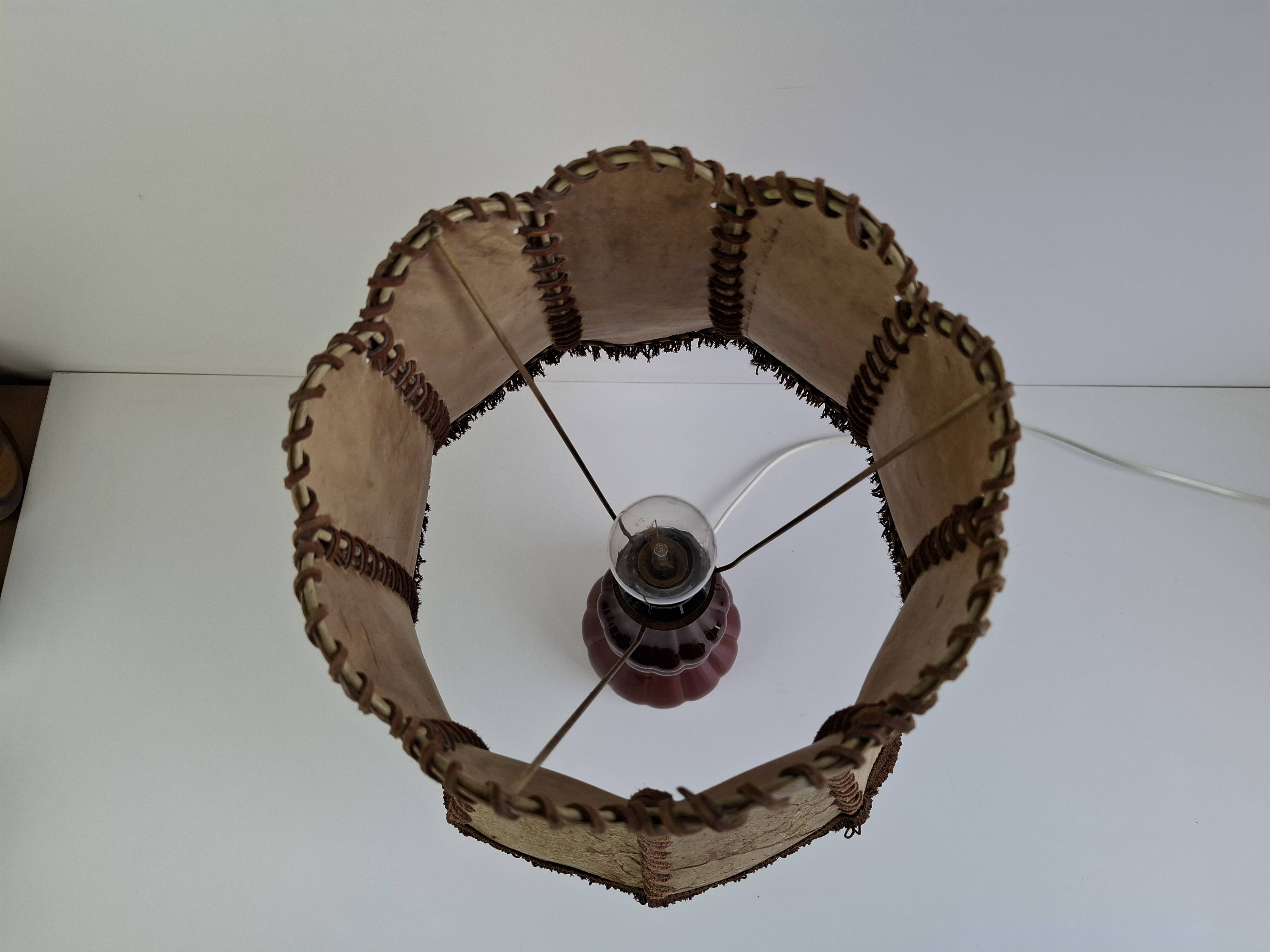 Vintage ceramic table lamp with hand-stitched leather shade, 1980s.