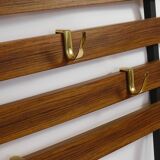 Wall coat rack by Carl Aubock with 5 brass hooks, walnut, iron, Austria, 1950s.