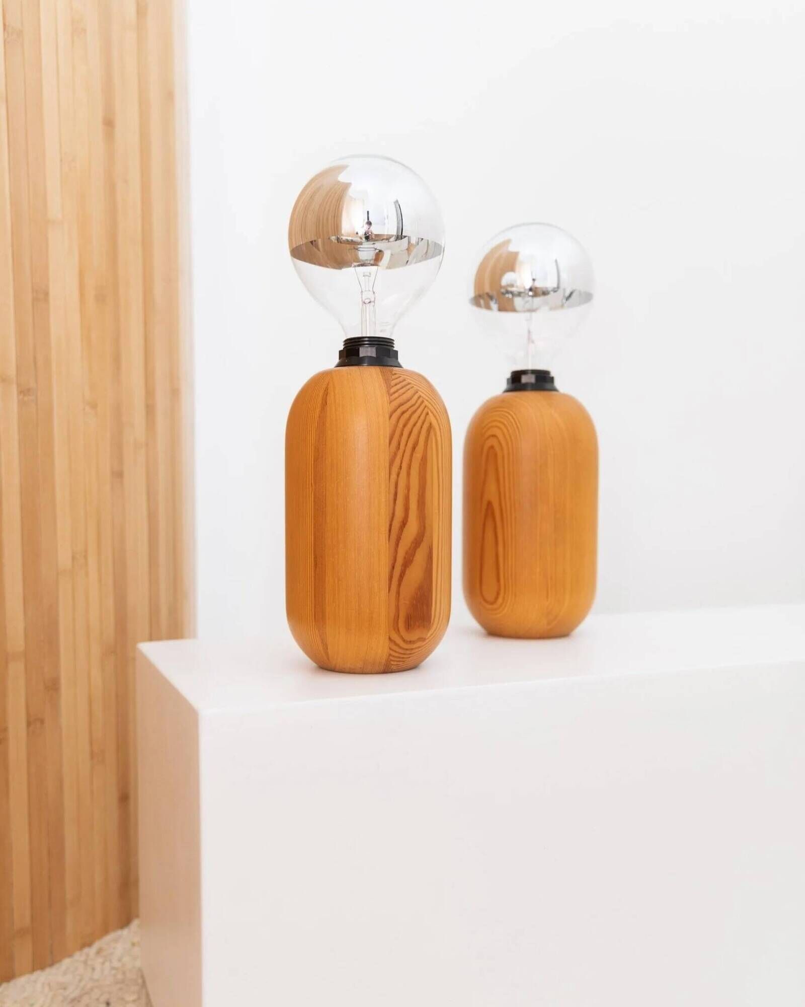 Pair of XXL Domus table lamps in marron wood with chrome globe bulbs