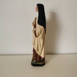 religious statue of Saint Therese of Lisieux in painted plaster