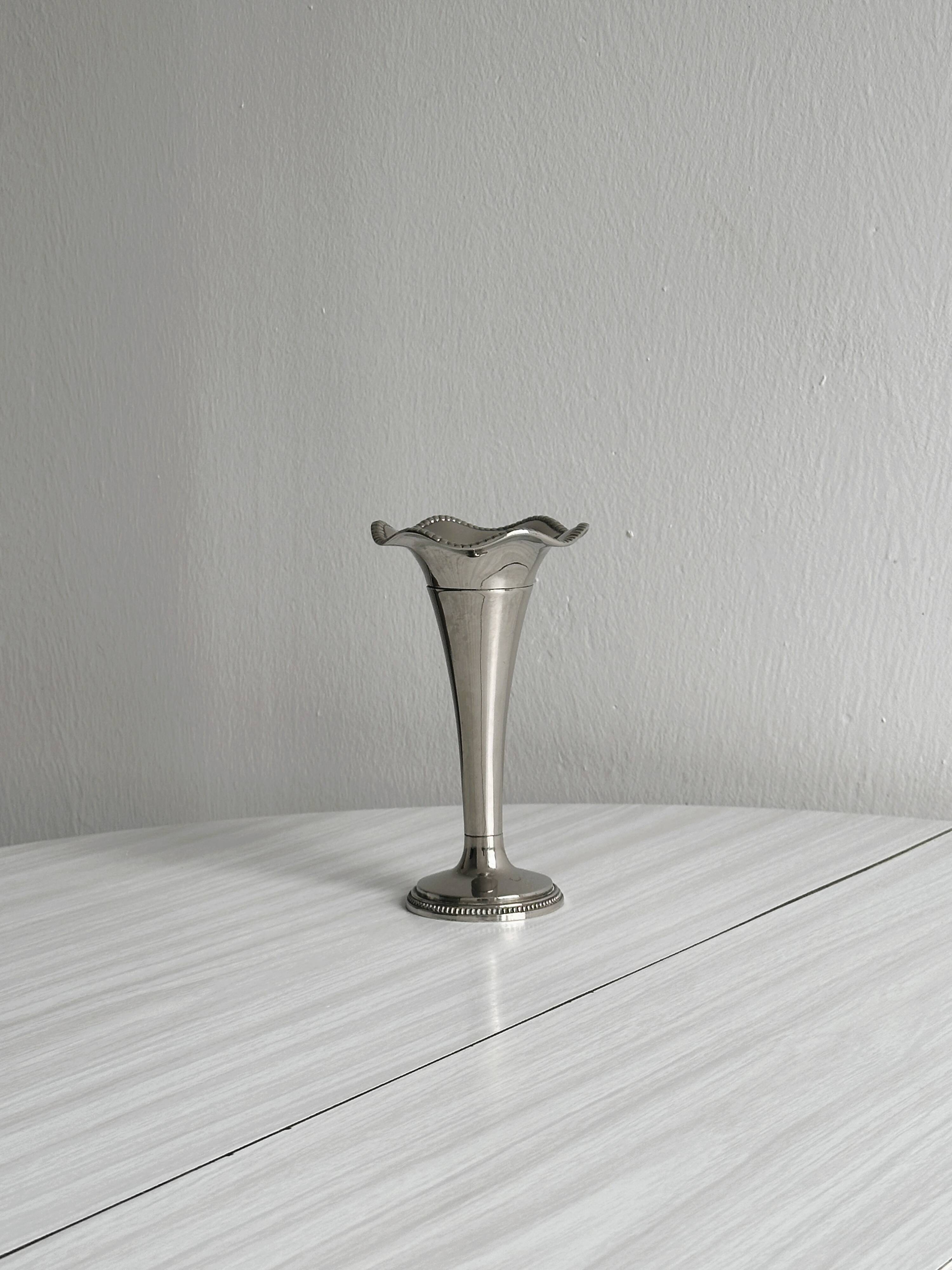 Small silver metal vase