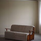 Modern Swedish two-seater independent sofa bed in pine and lambswool, 1950s.