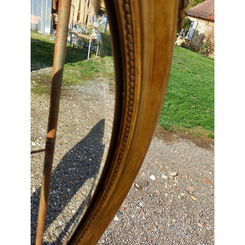 Miroir ovale en bois et stuc doré 19ème