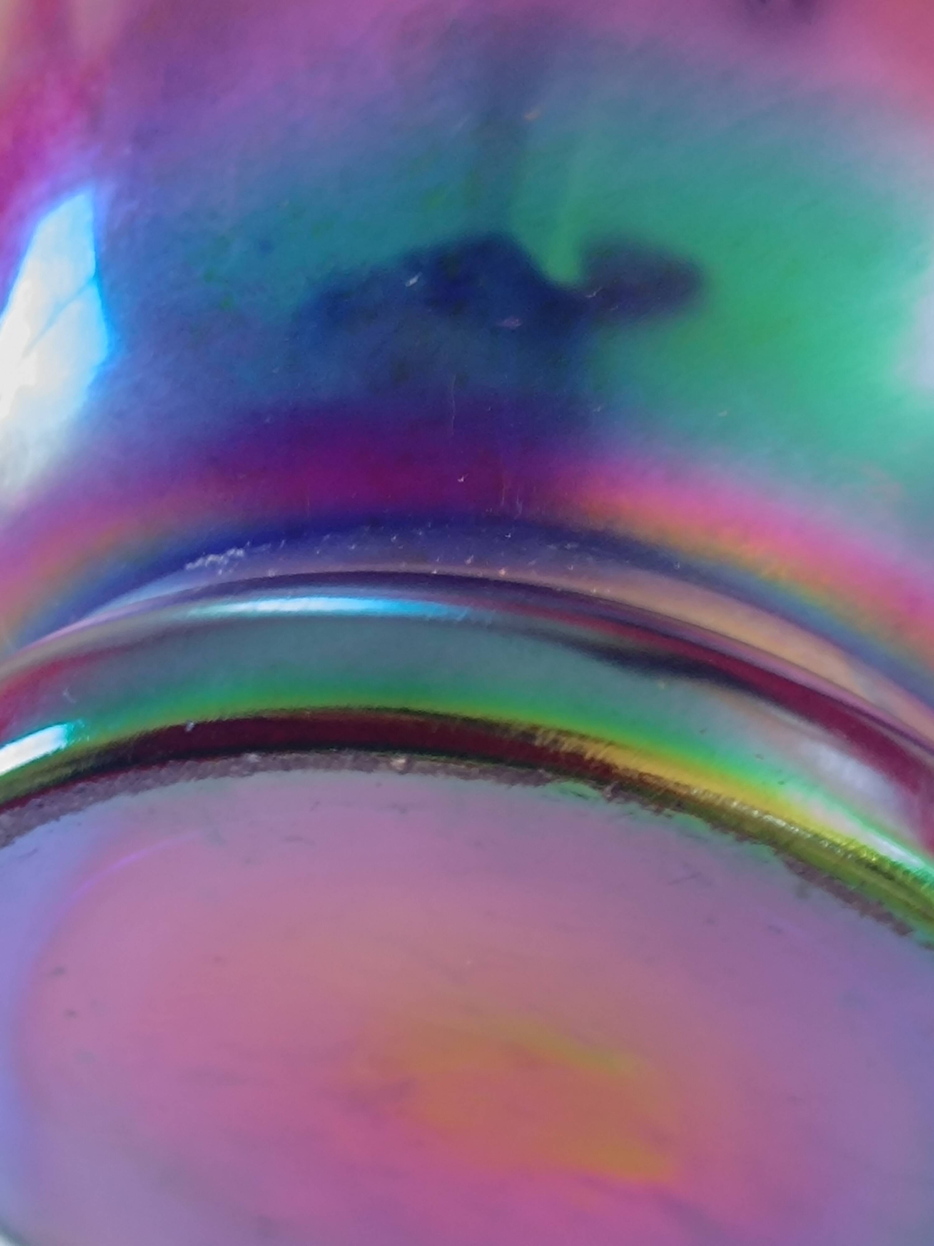 Iridescent glass vase with enamelled flowers, early 20th century