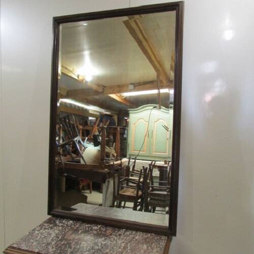 Large beveled mirror, simple wooden frame