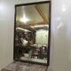 Large beveled mirror, simple wooden frame