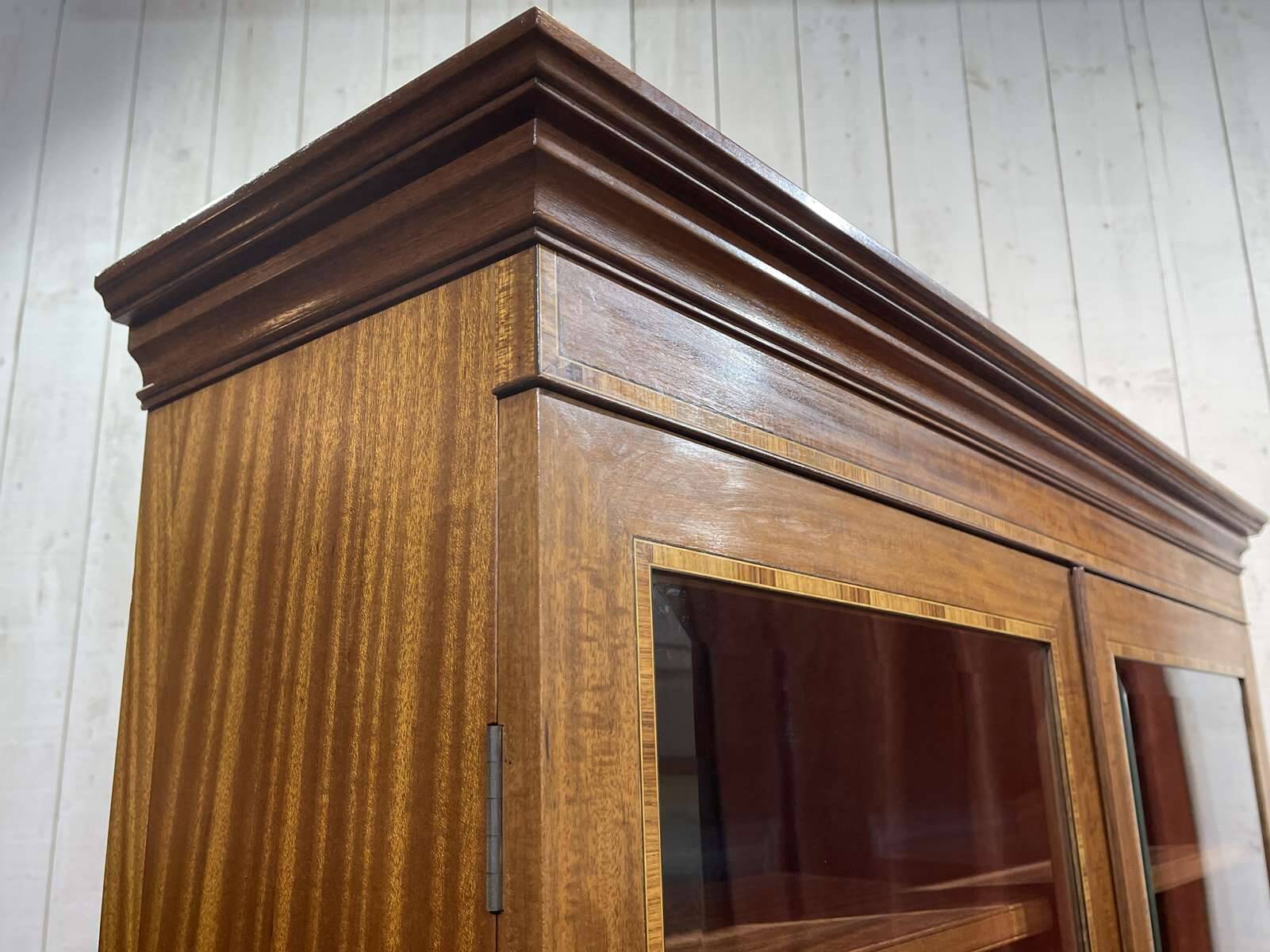 English two-piece mahogany bookcase from the 1950s